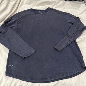 Stonewashed blue men’s size XXL long sleeve drop cut shirt.